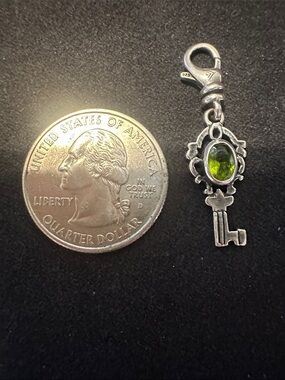 Silpada Sterling Silver Key Charm with Olive Green Stone